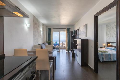 Postel nebo postele na pokoji v ubytování El Dorado, Ocean View & Wifi Free