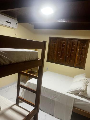 Postel nebo postele na pokoji v ubytování Casa Atalaia