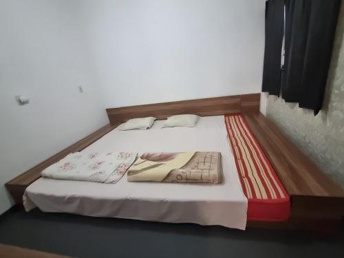 Casa de Mãe Vila Nery 5客房内的一张或多张床位