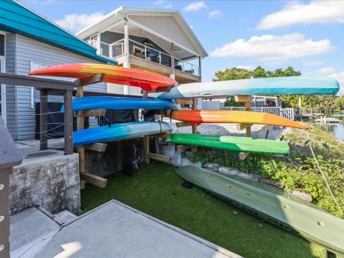 a group of colorful slides on a house at The Hideaway at Weeki Wachee in Weeki Wachee