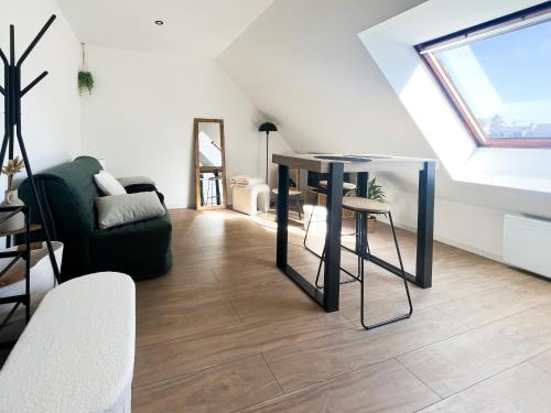 Χώρος καθιστικού στο Studio lumineux et rénové - 2 personnes