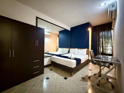 Ένα ή περισσότερα κρεβάτια σε δωμάτιο στο Alojamiento para 6 con alberca compartida