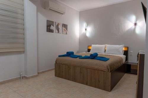 Postel nebo postele na pokoji v ubytování Aphrodite 's cozy house