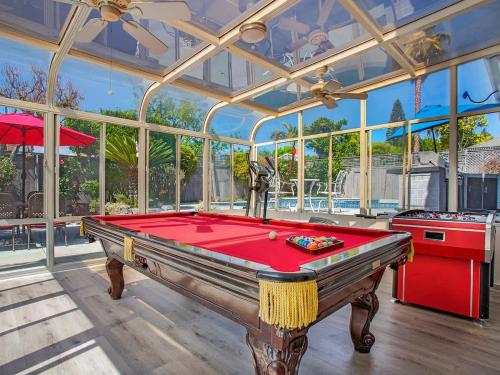 a pool table in a room with a ceiling at Charming Villa with Backyard Oasis Close to Beach in Laguna Hills