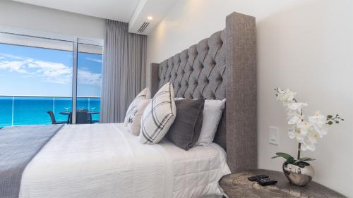 Ένα ή περισσότερα κρεβάτια σε δωμάτιο στο New & Amazing condo @ Encantame W604