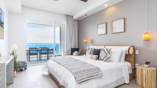 Ένα ή περισσότερα κρεβάτια σε δωμάτιο στο Encantame Towers Viento 1502