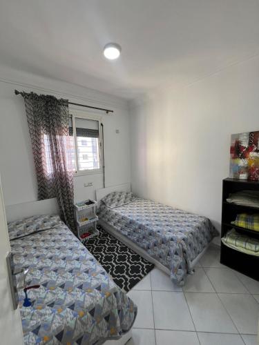 Postel nebo postele na pokoji v ubytování Modern 2-Bedroom Apartment in Agadir Family Stay Fiber WiFi 5 Guests