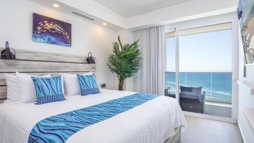 Ένα ή περισσότερα κρεβάτια σε δωμάτιο στο A peace of paradise awaits you Verano 2003 Encantame Towers