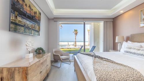 Postel nebo postele na pokoji v ubytování Encantame Towers Viento 105