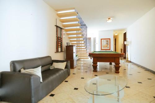 Χώρος καθιστικού στο Estudio confortable para 3 mas piscina compartida