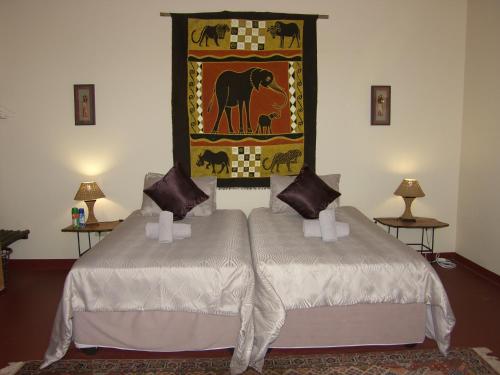 Postel nebo postele na pokoji v ubytování Roidina Safari Lodge