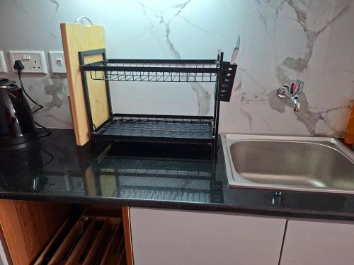 Kuchyň nebo kuchyňský kout v ubytování The Nest cozy stays