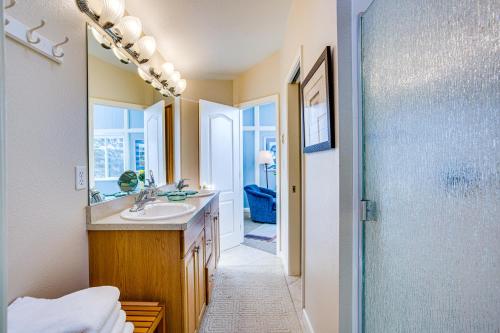 a bathroom with a sink and a shower at Ocean Views and Short Walk to Sandy Beach! Changes in Attitude in Bayshore