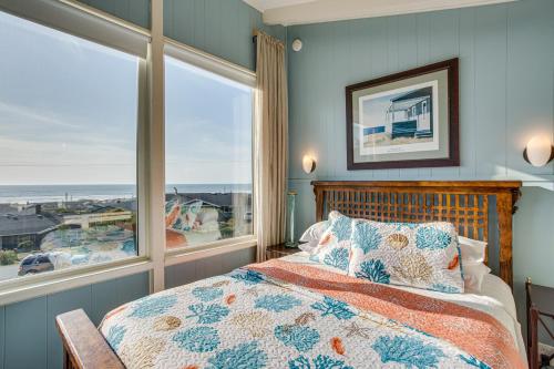 a bedroom with a bed with a view of the ocean at Ocean Views and Short Walk to Sandy Beach! Changes in Attitude in Bayshore