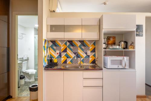 Kuchyň nebo kuchyňský kout v ubytování Hospedez - Flat Osasco Trade Center