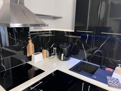 Kuchyň nebo kuchyňský kout v ubytování Jasmin