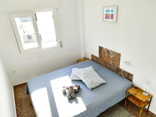 Ένα ή περισσότερα κρεβάτια σε δωμάτιο στο Encantador Estudio en Altea