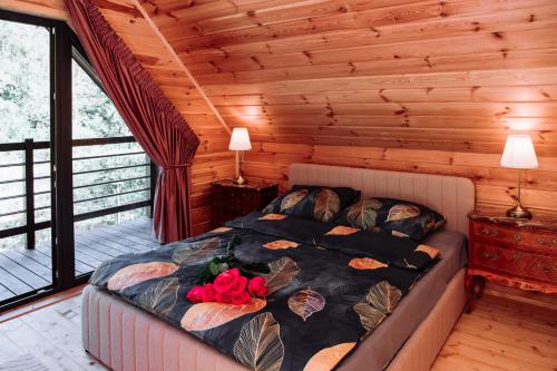 Postel nebo postele na pokoji v ubytování Black Resort Balia Sauna