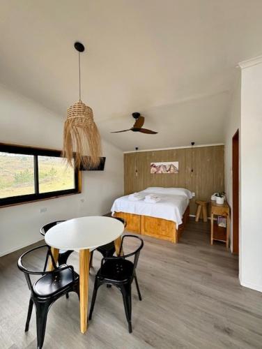 Ένα ή περισσότερα κρεβάτια σε δωμάτιο στο Entreaguas