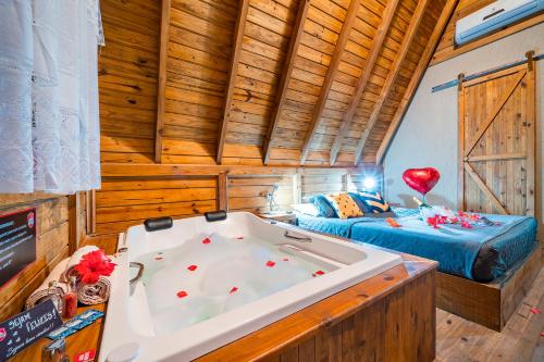 Postel nebo postele na pokoji v ubytování Pousada Chalé Suiço Bombinhas