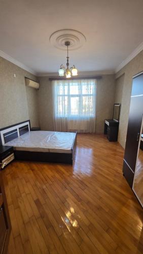 Llit o llits en una habitació de Квартира