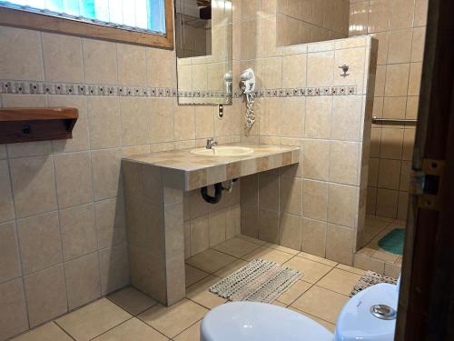 Koupelna v ubytování Hotel Tropical