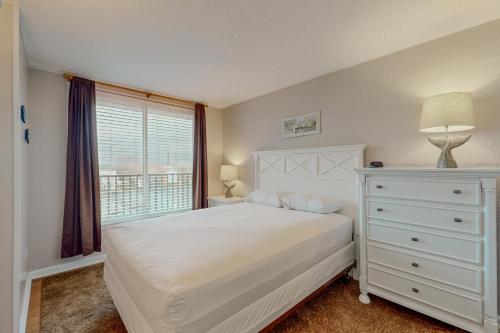 Ένα ή περισσότερα κρεβάτια σε δωμάτιο στο Polynesian 308