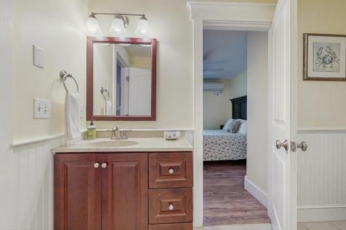 a bathroom with a sink and a mirror at The View II at Sheepscot River in Fort Edgecomb
