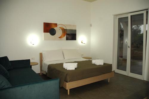 Postel nebo postele na pokoji v ubytování Casa Micò