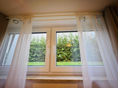 Fotografie z fotogalerie ubytování Waldblick Doppelzimmer-zwischen Bäumen&Träumen v destinaci Seligenstadt