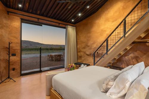 Ένα ή περισσότερα κρεβάτια σε δωμάτιο στο Honey Rock Landing