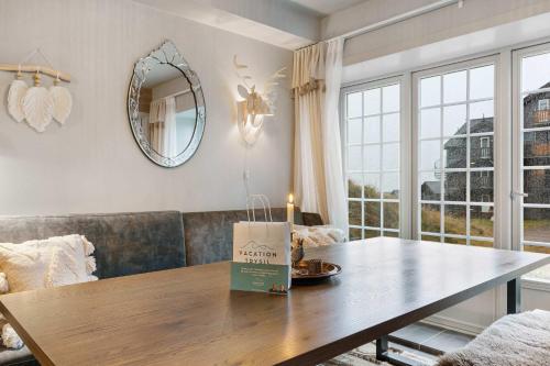 a living room with a table with a bag on it at TH963- Cozy Ski-in out apartment in Trysil in Trysil