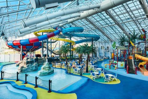 an indoor water park with a water slide at Residence Inn by Marriott Rapid City in Rapid City