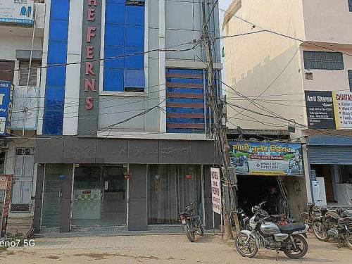 a group of motorcycles parked in front of a building at Hotel O The Ferns in Thānesar