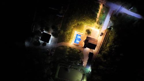 an overhead view of a building at night at Ranč Lipe in Orašje