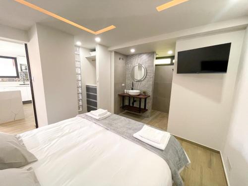 TV a/nebo společenská místnost v ubytování Casa Uldita