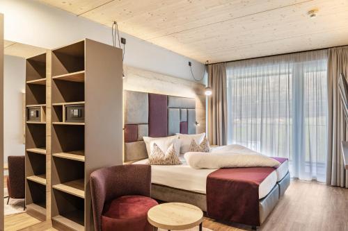 Hotel zum Schwanen - Appartement 2にあるベッド