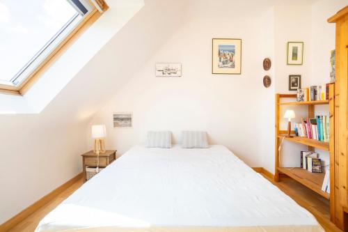 Postel nebo postele na pokoji v ubytování La maison à Landebec