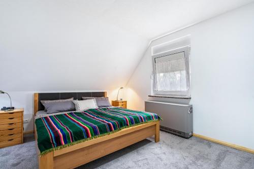 Ferienwohnung im Grünenにあるベッド