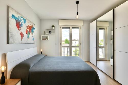 Una cama o camas en una habitación de VinHome