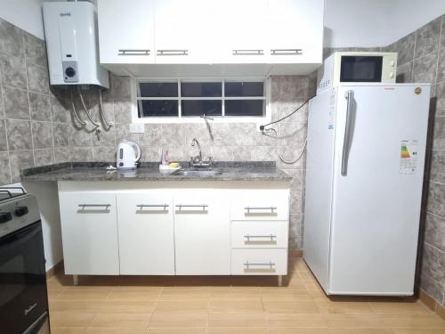 Kuchyň nebo kuchyňský kout v ubytování Casa de Tanti