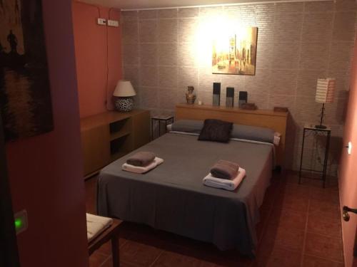 Postel nebo postele na pokoji v ubytování Sitges Llum House