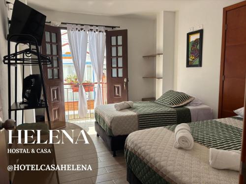 Postel nebo postele na pokoji v ubytování HC Helena