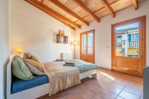 a bedroom with a bed in a room at Casa Jutta in Santa Margalida