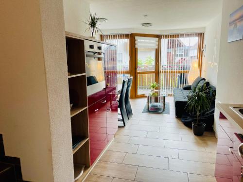 a living room with a couch and a table at Ferienwohnung Vogt in Sipplingen