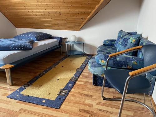 Khu vực ghế ngồi tại Ferienwohnung Heilsbronn