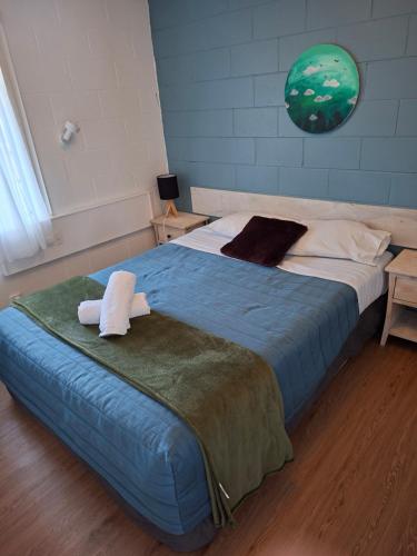 Ένα ή περισσότερα κρεβάτια σε δωμάτιο στο Aarangi Tui Motel