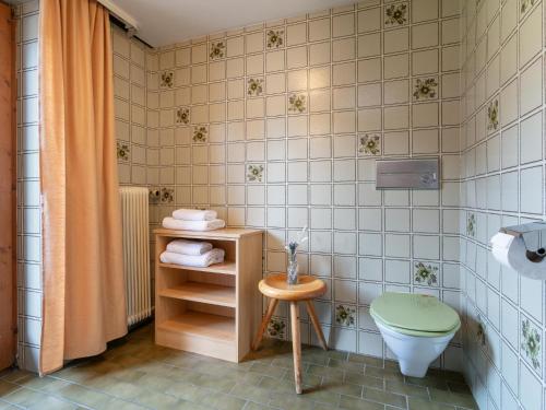 a bathroom with a sink and a toilet and a shower at Pension Schreder in Kirchberg in Tirol
