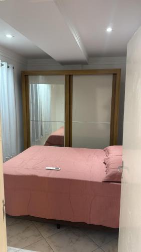 Ένα ή περισσότερα κρεβάτια σε δωμάτιο στο Premium Feira apartamento