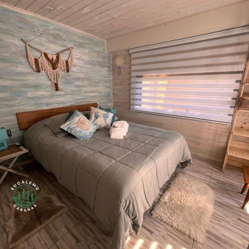 Una cama o camas en una habitación de Eucalemu - Quillay